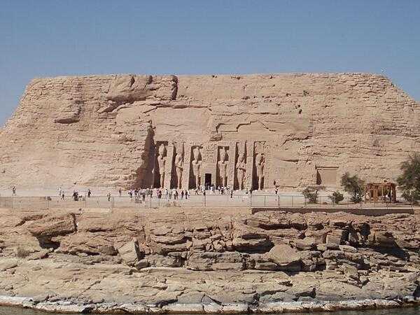 The Temple of Queen Nefertari at Abu Simbel in Egypt. The temple was dedicated to the god Hathor and stands 100 m (328 ft) to the right of the Temple of Ramses II. It is fronted by six colossal 10-meter (33-foot) statues of Ramses II and Nefertari. It was unusual that the two statues of the queen were the same height as the four statues of the king, and that a temple was dedicated to a queen.