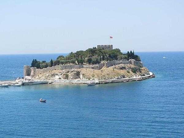 Pigeon Island (Guvercin Adasi) in the harbor of Kusadasi, Turkey. The fortress dates from the 14th and 15th centuries but was rebuilt in in 1834.