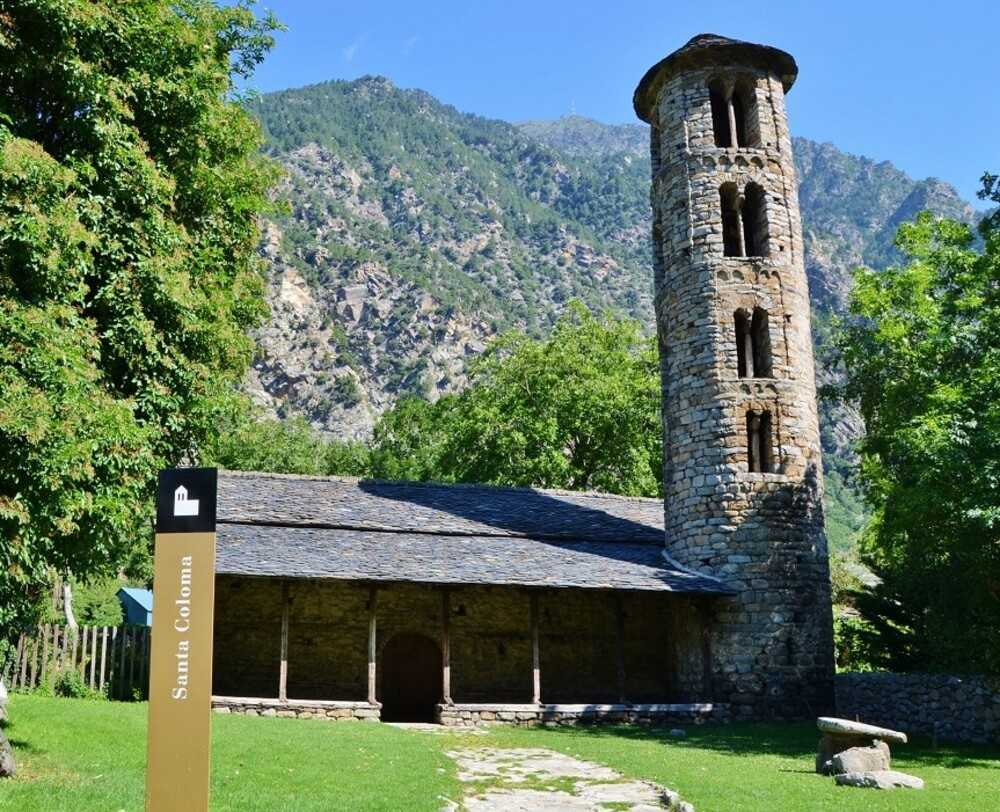 The Church of Santa Coloma d'Andorra, the oldest church in Andorra, is located in the Andorra la Vella Parish. It is dedicated to Columba of Sens, who is the patron saint of the country, and was built between the 8th and 9th centuries. The circular four-story bell tower was added during the 12th century. The church is featured on some Andorran euro coins.