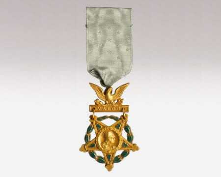 A green and gold medal of honor