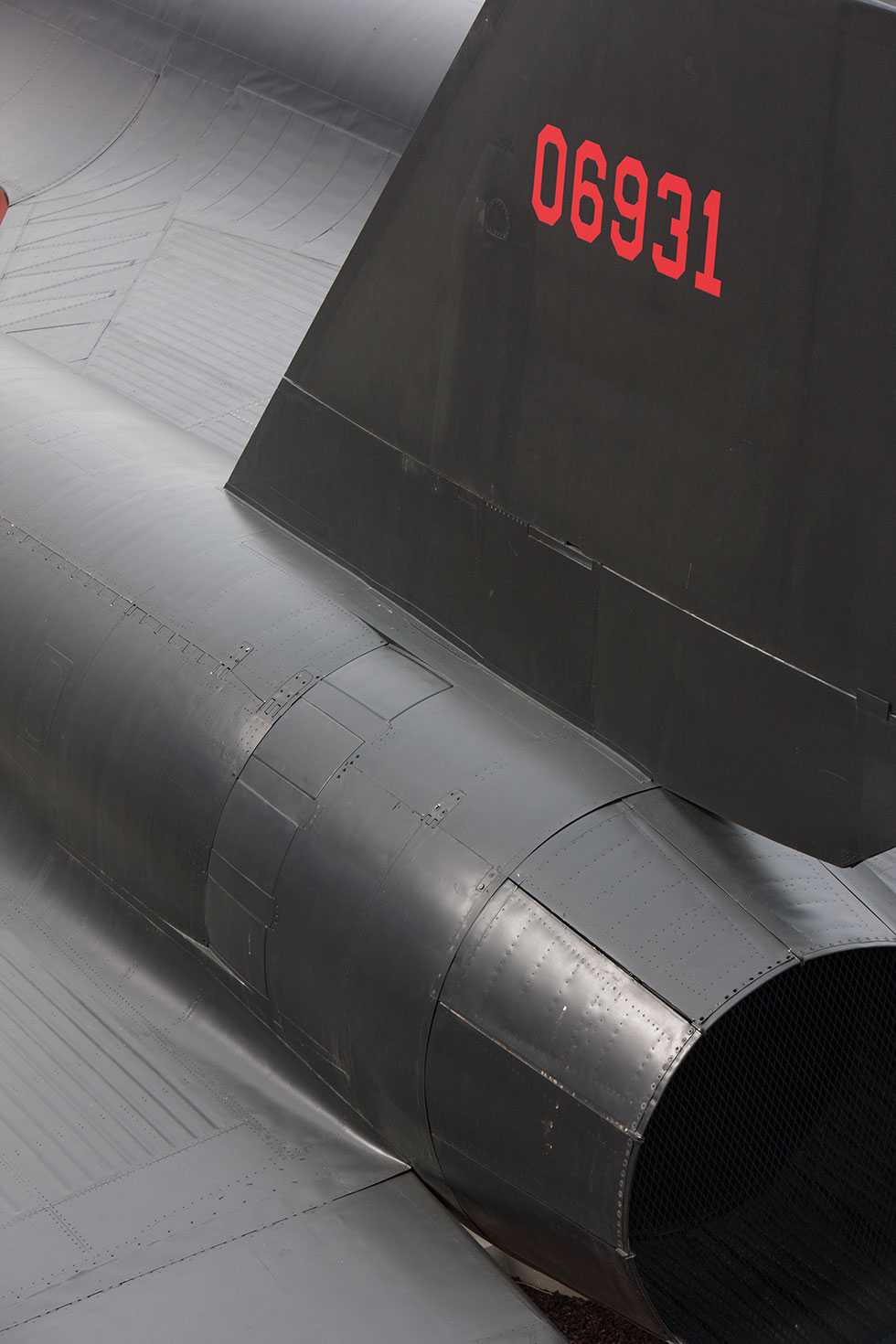 A close up shot of the tail of the A-12 Oxcart, with the red numbers 06931 on it.
