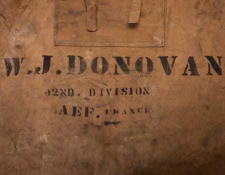 A close view of the lettering on the bag, reading "42nd division, AEF. France."