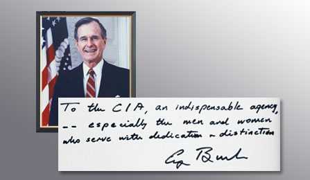 A picture of President George H.W. Bush and a handwritten note from him thanking the CIA for their services.