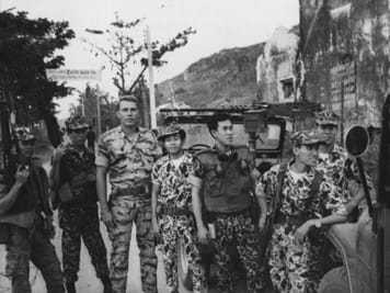 Image of U.S. and Vietnamese troops side by side.
