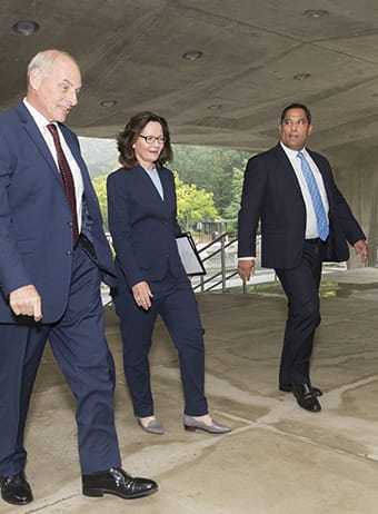 John Kelly,  Gina Haspel, and Brian Bulatao chatting and walking into the CIA Headquarters Building.