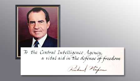 A picture of President Nixon and a handwritten note from him thanking the CIA for their services.