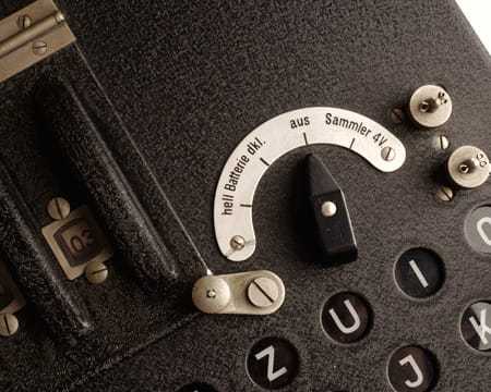 A small dial above the keyboard inside the machine
