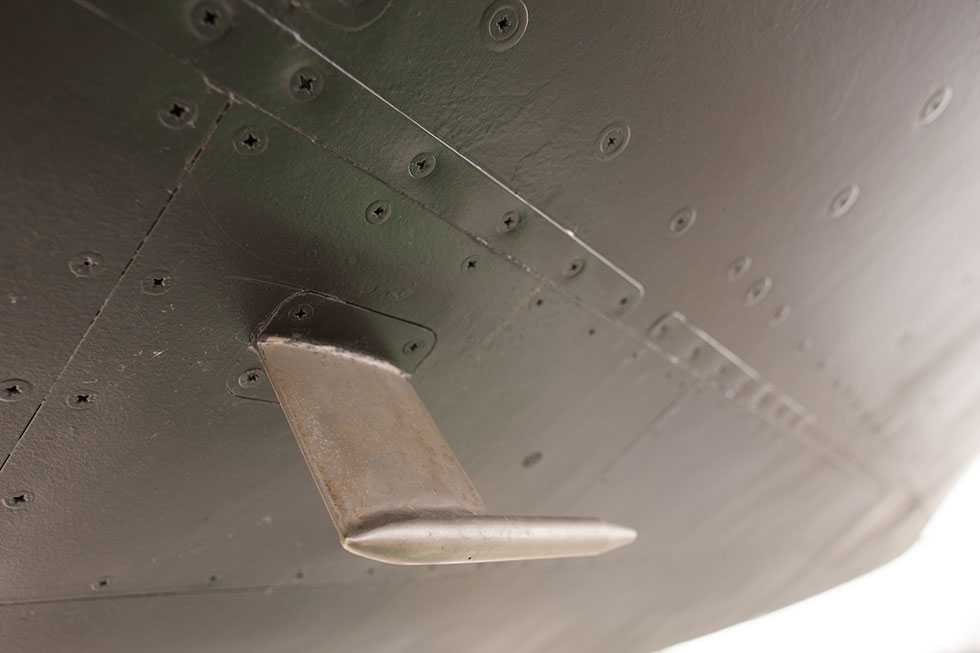 A close up of the underside of the black A-12 oxcart.