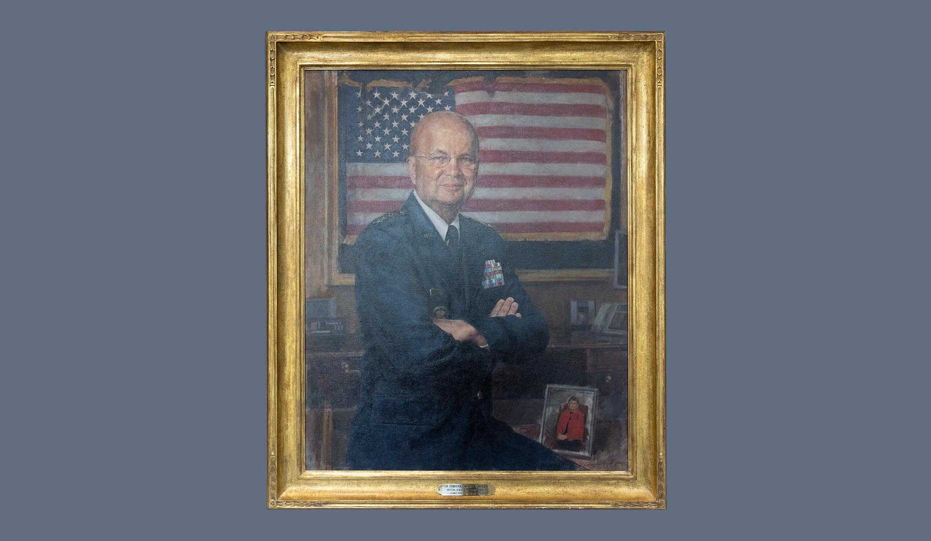 A portrait of former CIA director Michael V. Hayden in a gold frame.