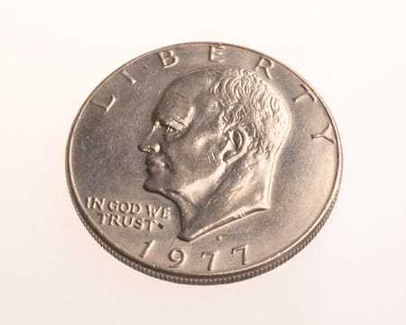 The front side of the hollow container disguised as an Eisenhower silver dollar