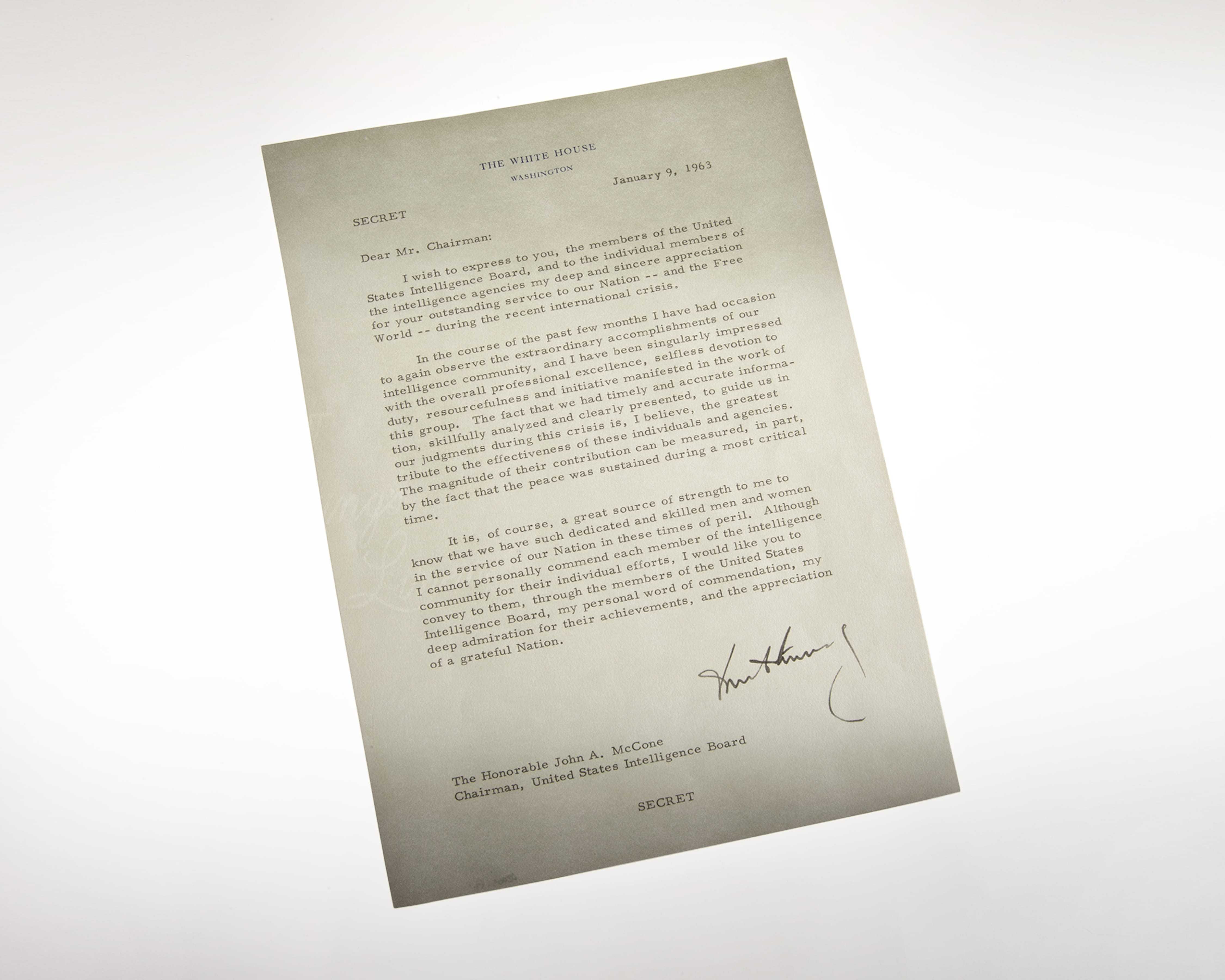 A three-paragraph letter on White House stationery signed at the bottom by President Kennedy