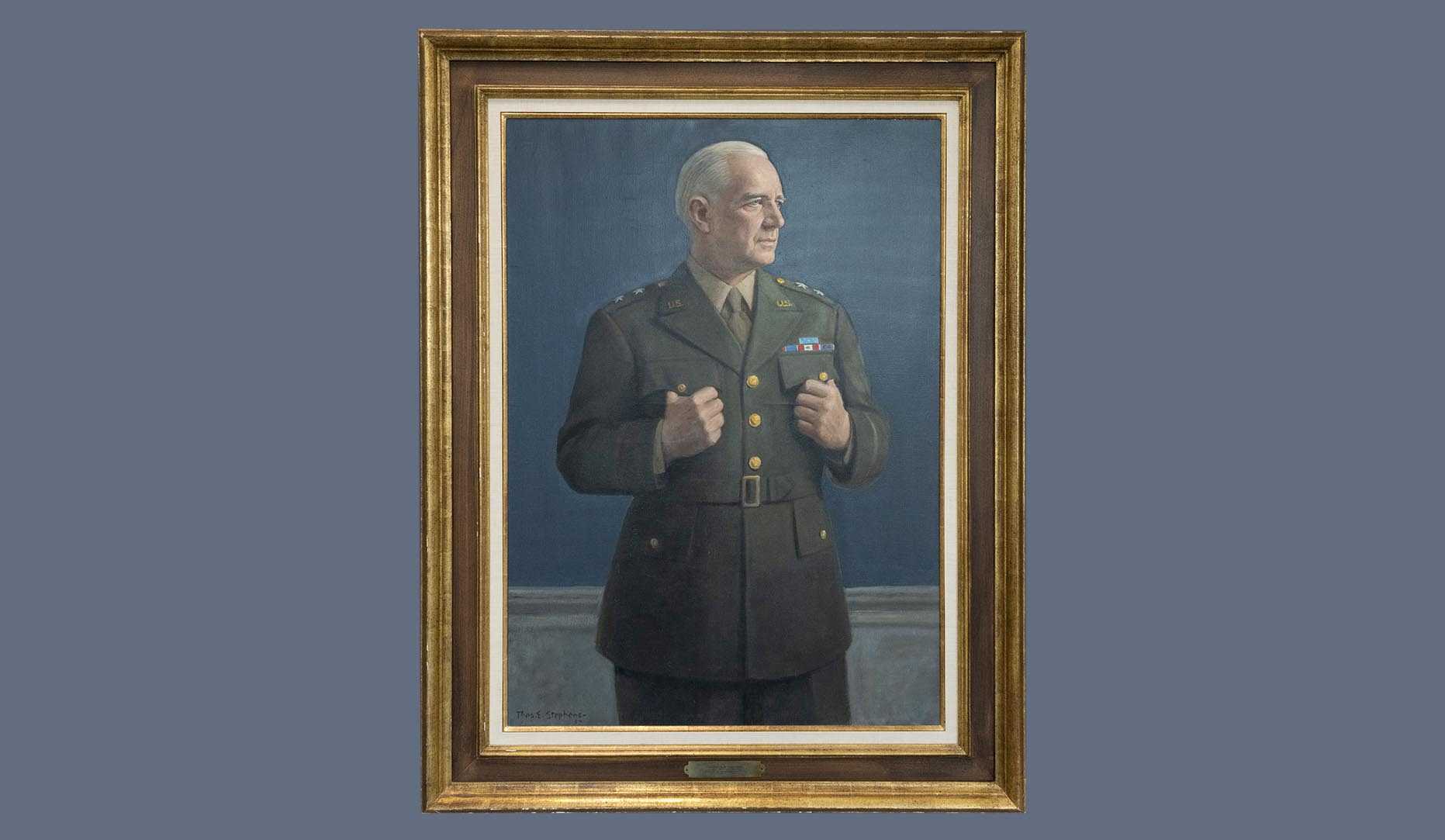A portrait of former CIA director William J. Donovan in a gold frame.