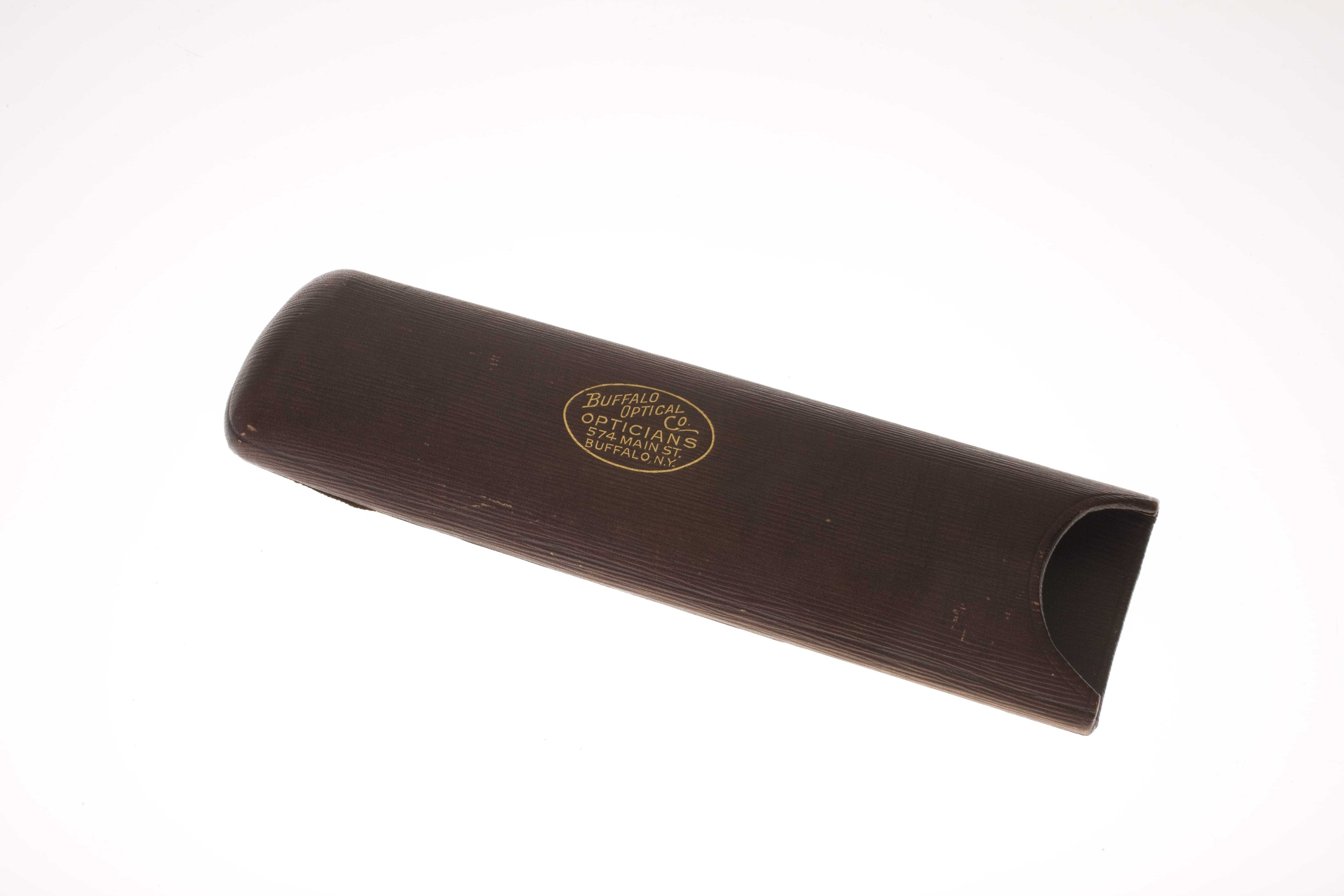 A brown eyeglasses case with the Buffalo Optical Co
