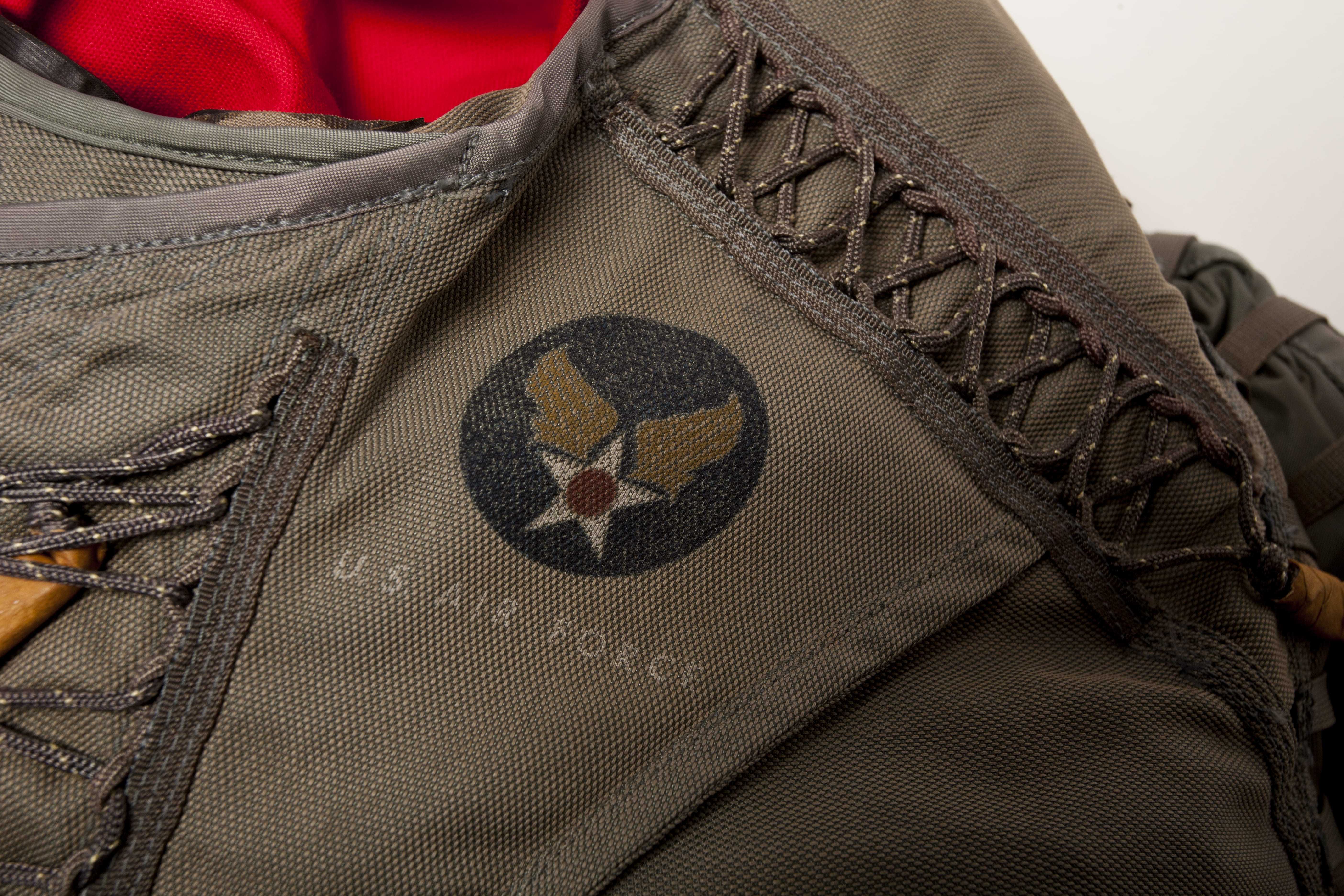 A close up of the U.S. Air Force insignia on the left side of the bodysuit.