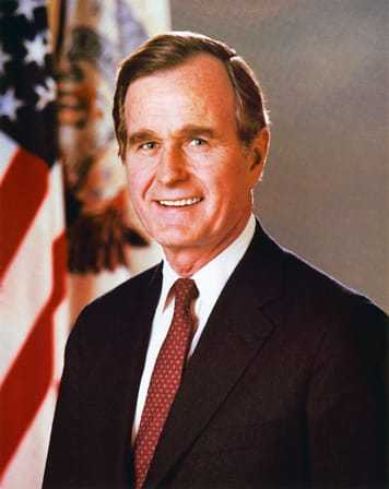 Official headshot of George H. W. Bush in front of the U.S. flag.