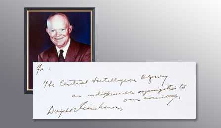 A picture of President Eisenhower and a handwritten note from him thanking the CIA for their services.