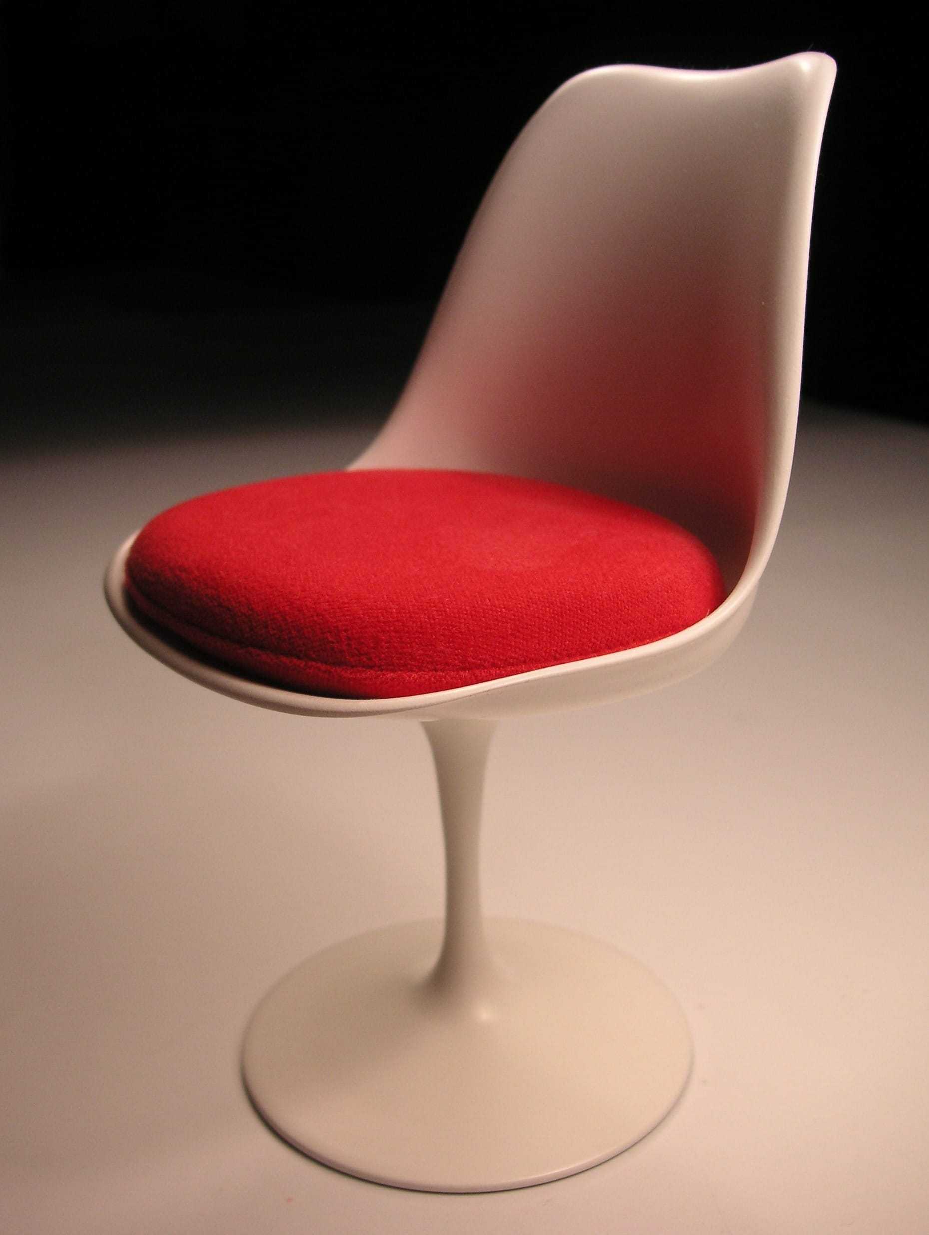 A modern white and red chair.