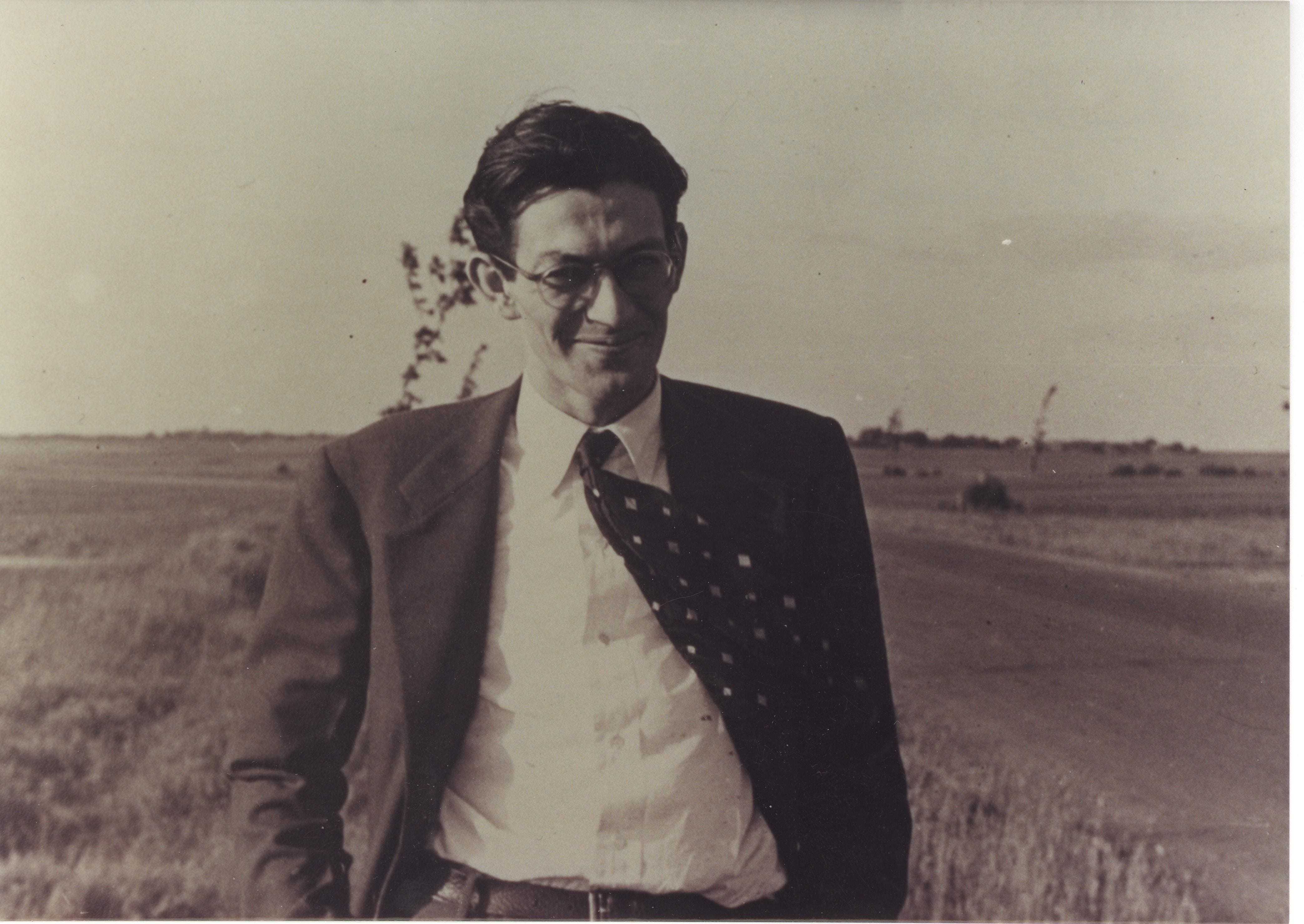 James Angleton walking in a field in Italy.