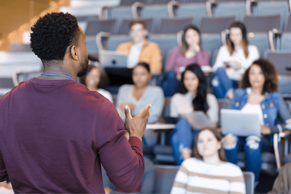 professor and students in college lecture hall