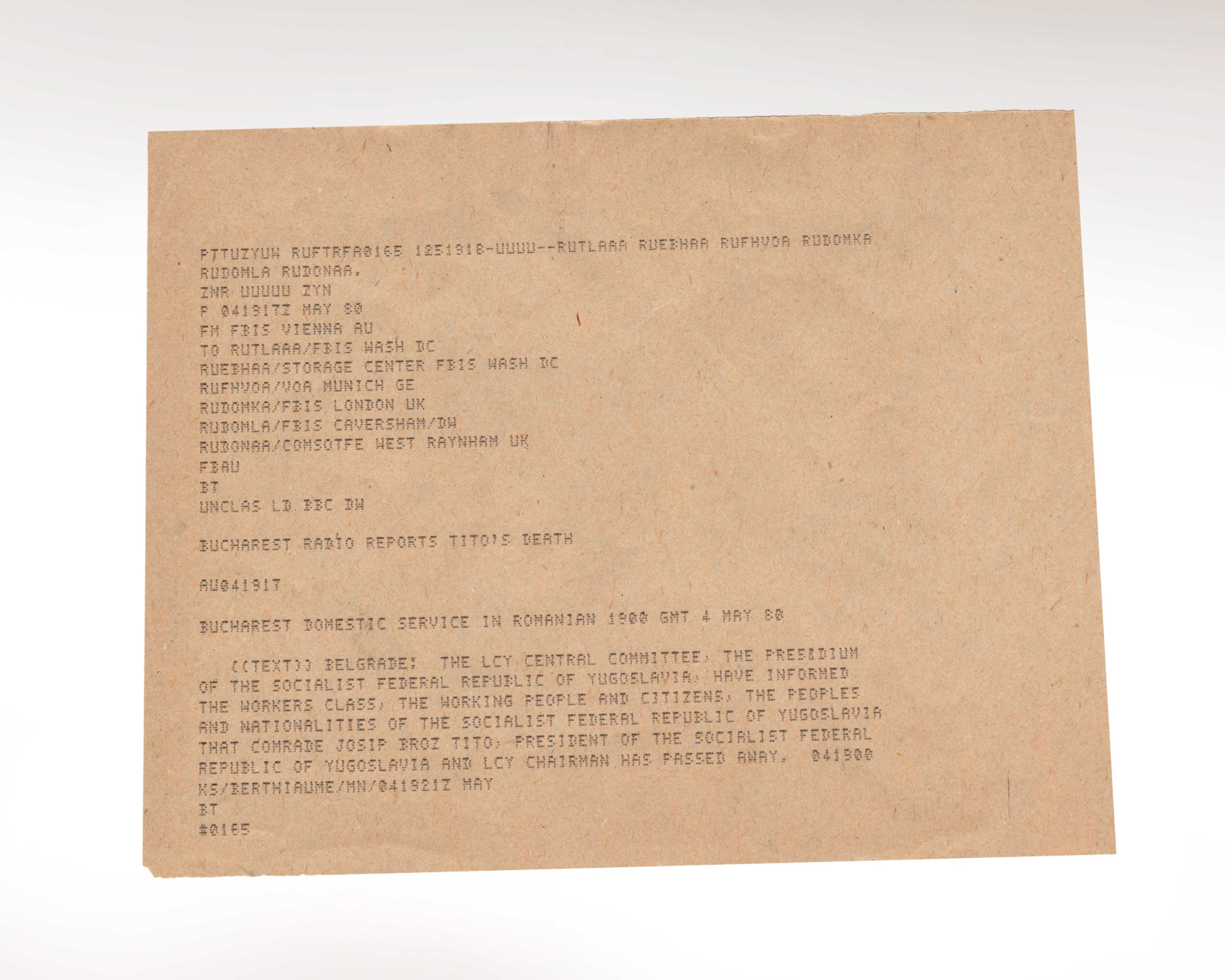 A short, typed message from the FBIS on a brown card