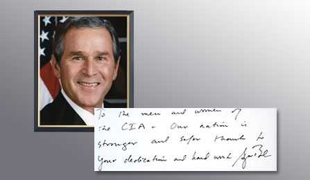 A picture of President George W. Bush and a handwritten note from him thanking the CIA for their services.