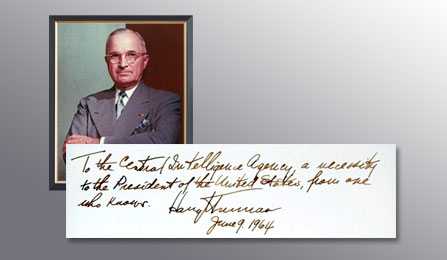 A picture of President Truman and a handwritten note from him thanking the CIA for their services.