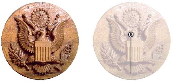 Details of listening device in a wooden carving of the Great Seal of the United States
