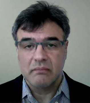 Headshot of Former CIA Officer John Kiriakou.