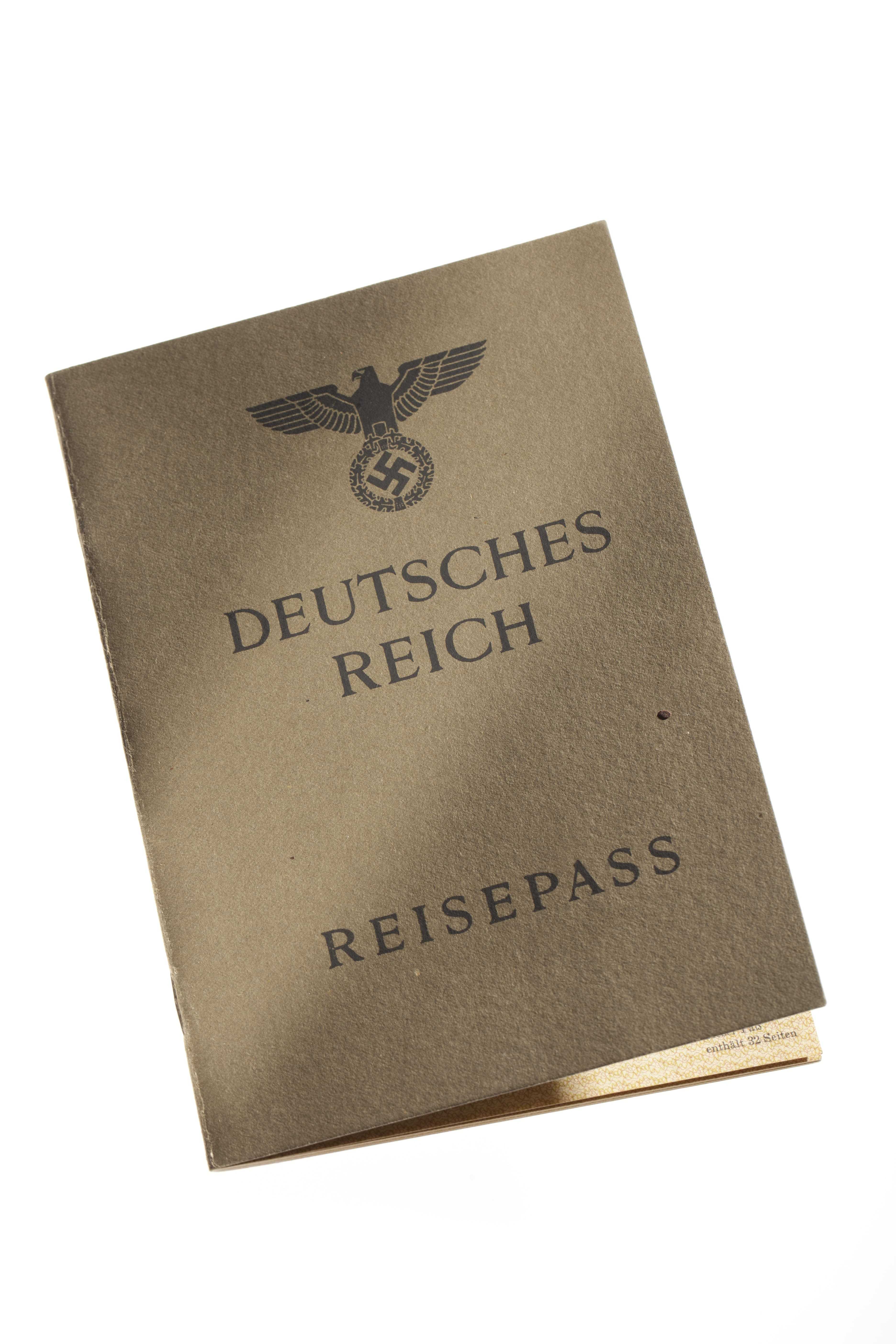 The cover of a forged German passport with the Nazi emblem and German text.