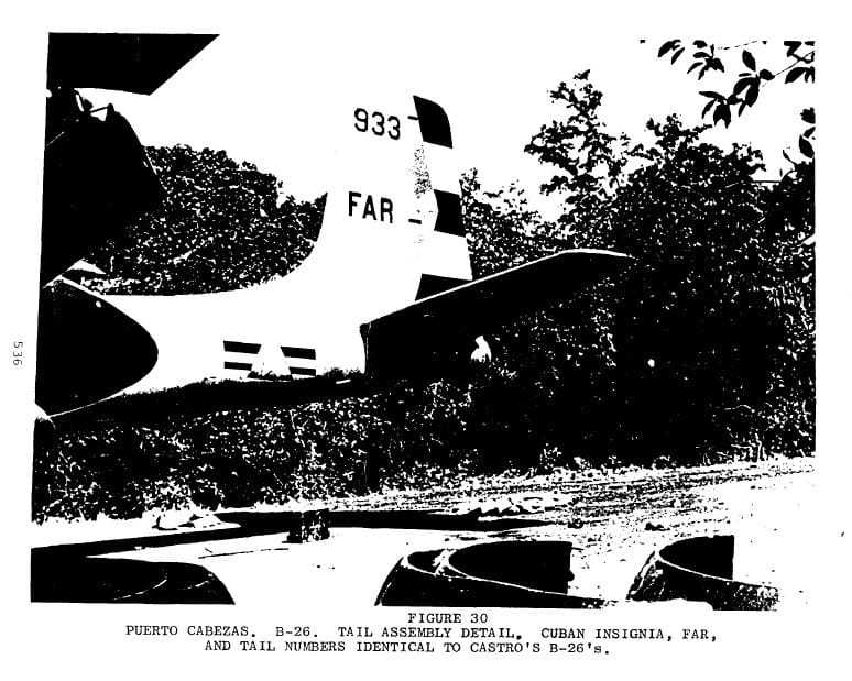 A black and white photograph of a B-26 tail with the ID: "933 FAR."