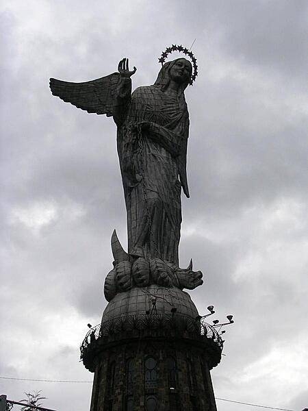 A statue of the &quot;Virgin of the Apocalypse&quot; on El Panecillo (Bread Loaf Hill), overlooking Quito. The 45 m- (148 ft-) tall aluminum statue depicts the Virgin Mary with wings.