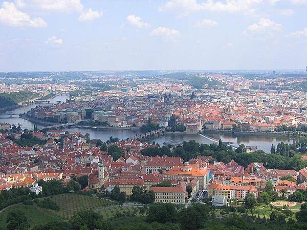 A view of Prague as seen from Castle Hill. The famous Charles Bridge over the Vltava (Moldau) River may be seen in the center of the image.