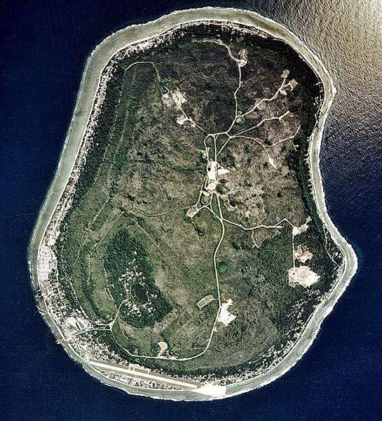 Satellite photo of Nauru vividly displays some of the prominent features of the island including roadways, the landing strip of the international airport in the south, and the Buada Lagoon in the southwest. Image courtesy of the US Department of Energy's Atmospheric Radiation Measurement Program.