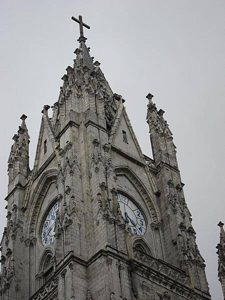 One of the front towers of the Basilica del Voto Nacional (Basilica of the National Vow), a Roman Catholic church in the historic center of Quito. Begun in the late 19th century, it was consecrated in 1988. Technically the basilica remains unfinished, since, according to local legend, its completion would signal the end of the world.
