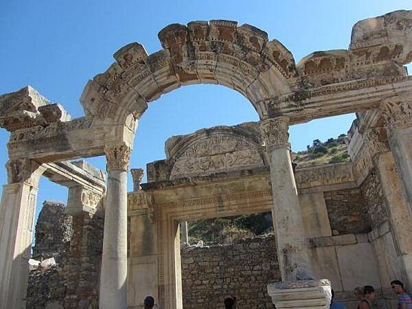 Ruins of the Temple of Hadrian in Ephesus. The temple dates to the 2nd century A.D.; it underwent repairs in the 4th century. The structure has been partially reconstructed from surviving architectural fragments.