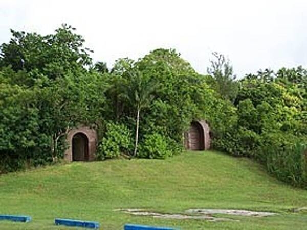 Once a Japanese naval communications center, Fonte Plateau unit is located on Nimitz Hill, overlooking Asan Bay. Site of one of the more bitter battles between the US Marines and the Japanese, the high land of Fonte Plateau, later renamed Nimitz Hill, was once the CINCPAC headquarters for Admiral Chester Nimitz. Photo courtesy of the US National Park Service.