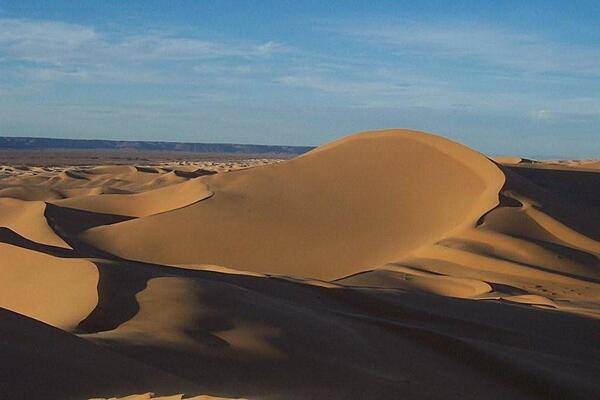 Sahara dunes at sunset.