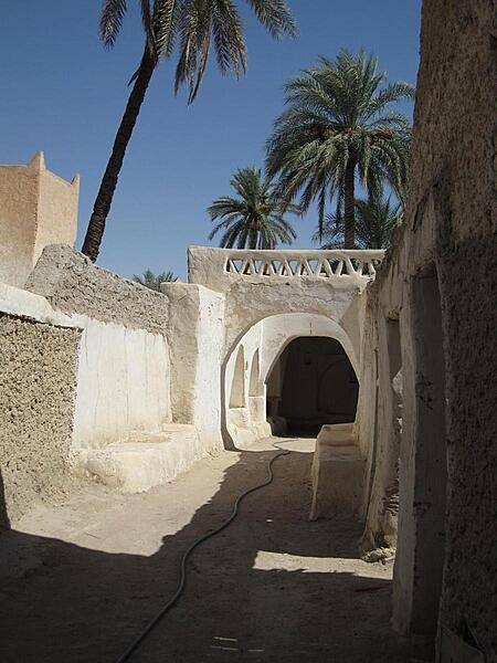 Ghadames is an oasis town located some 550 km (340 mi) southwest of Tripoli. The site was an important stop along the old caravan routes across the Sahara. The Old City, shown here, was organized spatially and socially into seven clans.