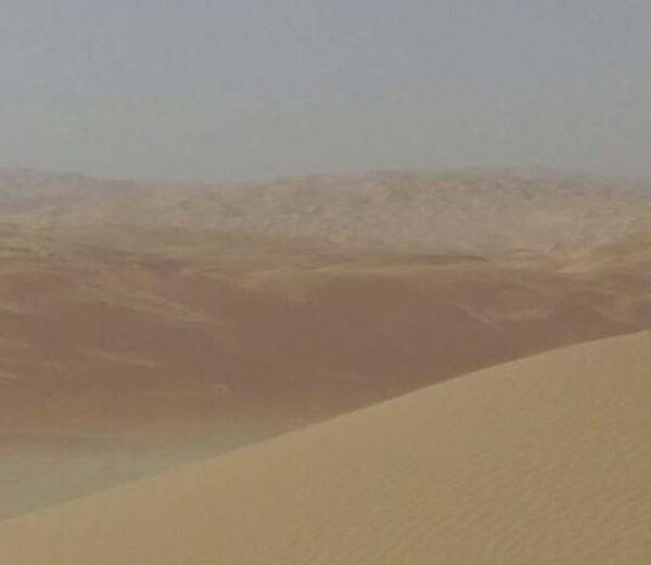 South and west of Abu Dhabi, vast, rolling sand dunes merge into the Rub' al Khali (Empty Quarter). The Rub' al Khali is a sand desert encompassing the southern third of the Arabian Peninsula, including southern Saudi Arabia, and areas of Oman, the United Arab Emirates, and Yemen. The desert covers some 650,000 sq km (250,000 sq mi).