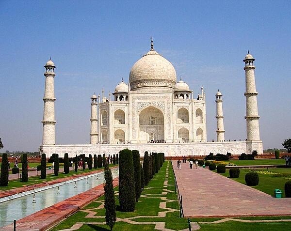 Emperor Shah Jahan built the Taj Mahal between 1632 and 1653 to honor the memory of his favorite wife. Located 200 km (125 mi) from New Delhi in Agra, India, it took nearly 22 years, 22,000 workers, and 1,000 elephants to complete the white marble mausoleum.