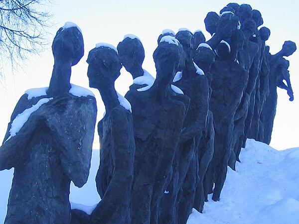 A view of the Yama (Death Pit) Holocaust Memorial in Minsk, Belarus. The figures are part of a group descending into the pit to be executed.