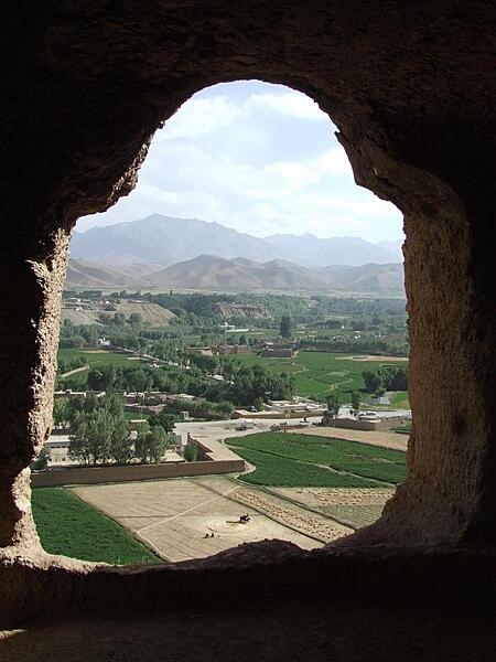 View of surrounding farmlands from inside the caves at the &quot;Large Buddha&quot; in Bamyan, Afghanistan. The caves were once inhabited by Buddhist monks who left behind a legacy of religious frescoes and paintings, partially destroyed by the fundamentalist Taliban.