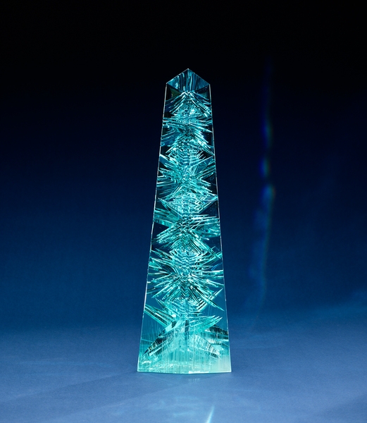 Aquamarine, often called the treasure of mermaids, is found and mined in Brazil and in countries that fall along the Mozambique geological belt in Africa. The “Dom Pedro,” the largest single piece of cut-gem aquamarine in the world, was found in a Brazilian mine in the late 1980s and is named after Brazil’s first two emperors (both named Pedro). The original crystal, weighing roughly 45 kg (100 lb), shattered into three pieces during excavation. The largest section (pictured) was sculpted into an obelisk shape about 35.5 cm (14 in) tall and weighing 10,363 carats or 2.1 kg (4.6 lbs). It is part of the Smithsonian National Museum of Natural History's collection in Washington, DC. Photo courtesy of the Smithsonian/ Greg Polley.