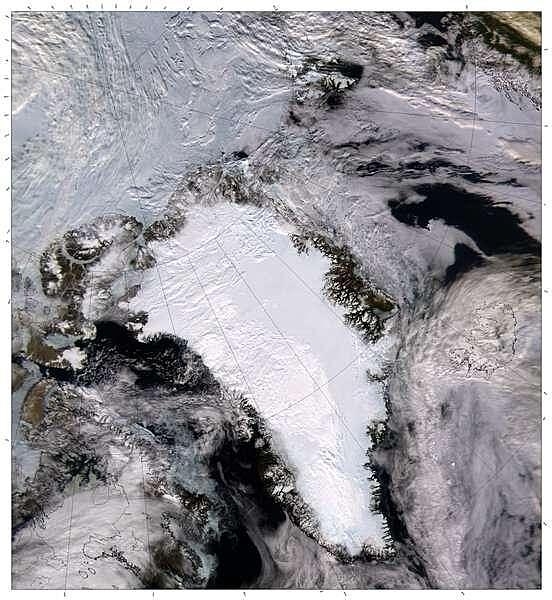 A view of the northern part of the world showing all of glacier-topped Greenland cloud-free. The point in the upper left where the longitude lines converge over the ice-clogged Arctic Ocean is the North Pole. The islands in the upper center are those of Svalbard. Image courtesy of NASA.