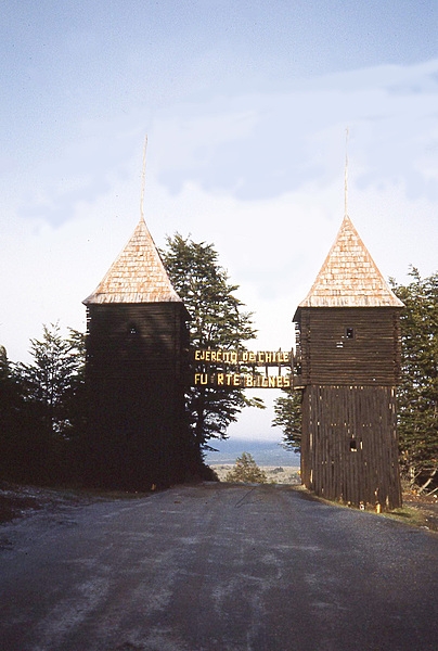 The entrance to Fuerte Bulnes, a Chilean fort located by the Strait of Magellan, 62 km (38 mi) south of Punta Arenas. The fort was originally built in 1843 to encourage colonization in Southern Chile, protect the Strait of Magellan, and ward off claims by other nations. Harsh weather prevented large-scale settlement, and after the government founded Punta Arenas to the north in 1848, the fort was abandoned and burned. Between 1941 and 1943, it was reconstructed and in 1968 became a national monument.