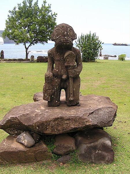 Stone tiki on Nuku Hiva Island in the Iles Marquesas archipelago in French Polynesia.