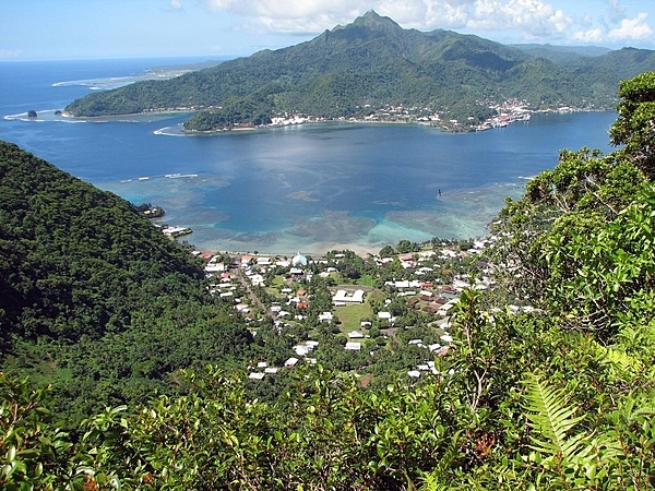 A view of Pago Pago Harbor on Tutuila Island in American Samoa; the mouth (entrance) is to the left. Photo courtesy of the US National Park Service.