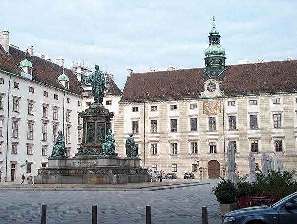 The Amalienburg section of the Hofburg (Imperial Palace) in Vienna, Austria. Of note is the small domed tower with an astronomical clock. The statue honors Holy Roman Emperor Francis II (r. 1792-1806), who was also Austrian Emperor Francis I (r. 1804-1835), thus making him the only double emperor in history.