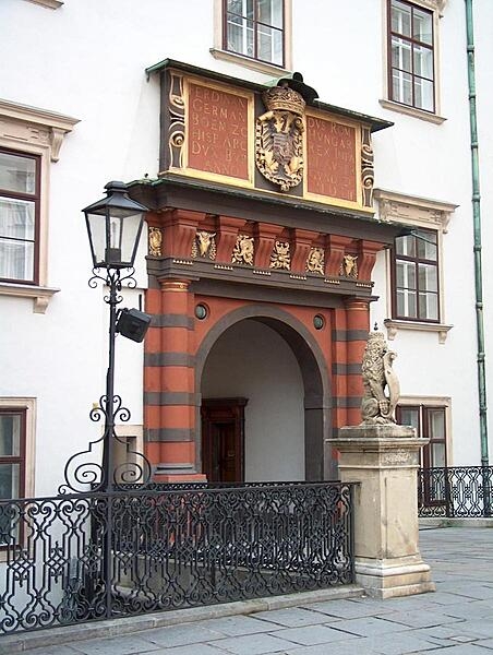 The Hofburg area of Vienna, Austria, has been a documented seat of government since 1279. The Schweizertor (Swiss Gate, built 1552), opens into the Alte Burg, the oldest section of the Hofburg.