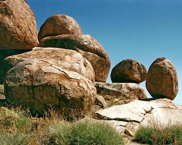 Some of the granite boulders at Devils Marbles Conservation Reserve near Wauchope, in Australia's Northern Territory. The marbles were formed through various geological processes, including chemical and mechanical weathering.